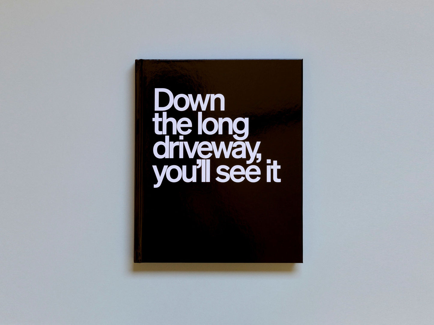 Down the long driveway, you'll see it